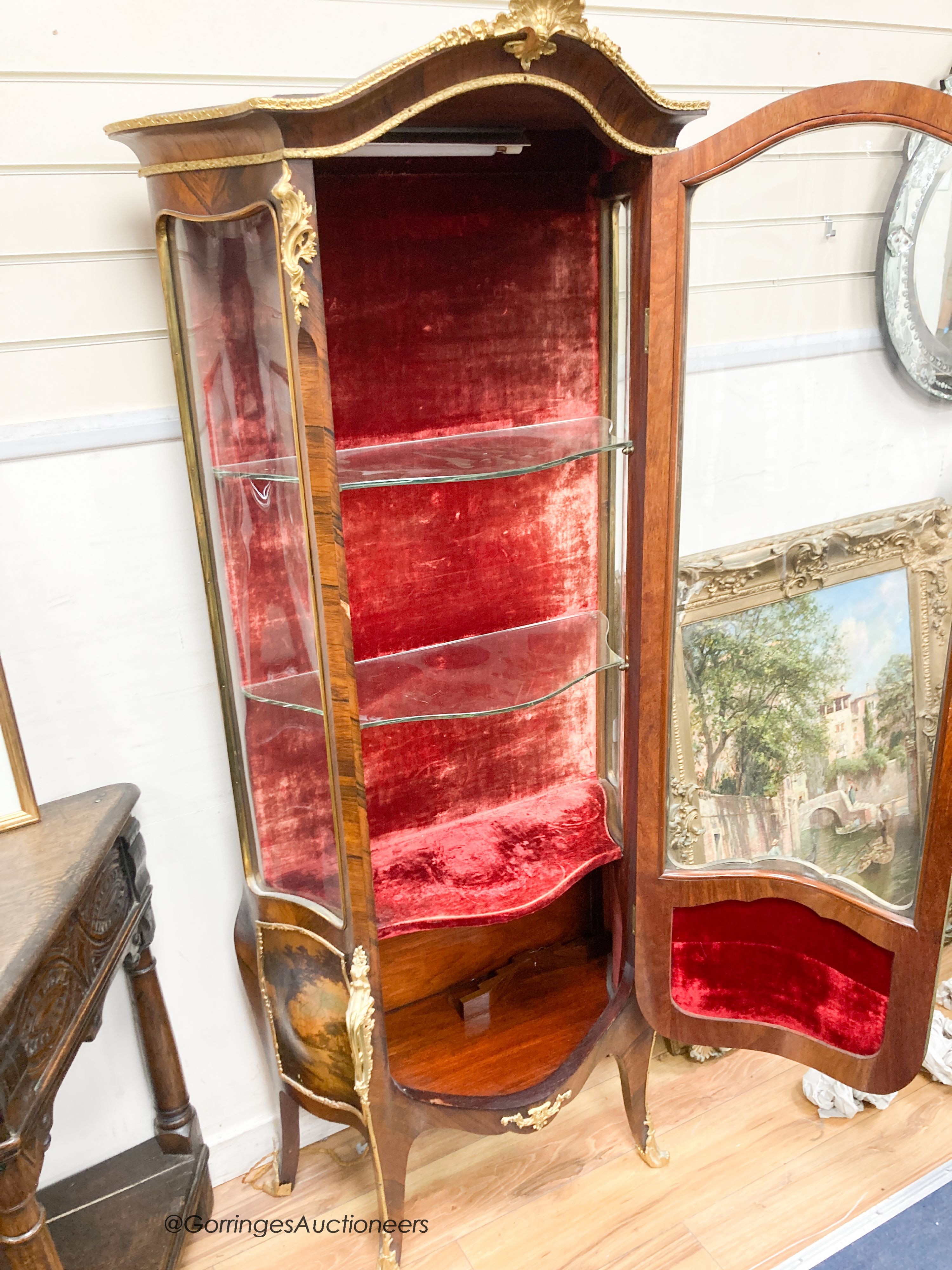 A Louis XV style kingwood bombe vitrine, with Vernis Martin style panels and ormolu mounts, width 74cm, depth 40cm, height 176cm